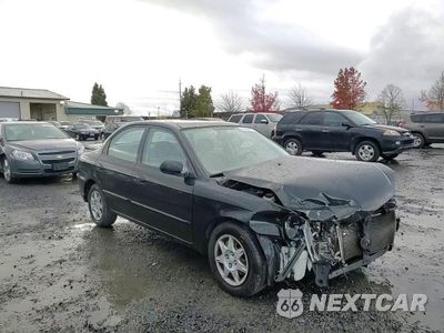 Zdjęcie 11 z 14 samochodu: 2002 KIA SPECTRA BASE VIN:KNAFB121225171948 - miniatura