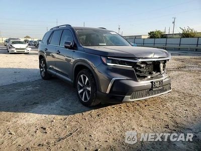 Zdjęcie 12 z 15 samochodu: 2023 HONDA PILOT ELITE VIN:5FNYG1H88PB038103 - miniatura