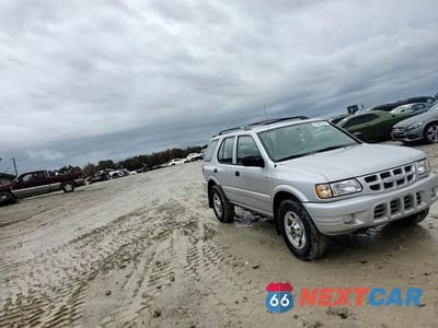 Zdjęcie 12 z 14 samochodu: 2000 ISUZU RODEO S VIN:4S2DM58WXY4346884 - miniatura