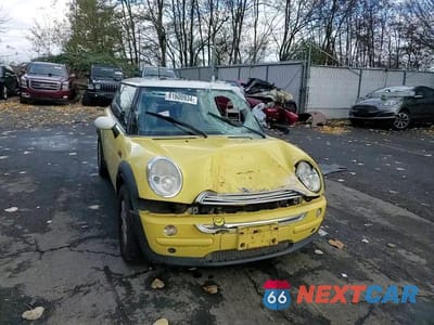 Zdjęcie 11 z 14 samochodu: 2004 MINI COOPER VIN:WMWRC334X4TJ61472 - miniatura