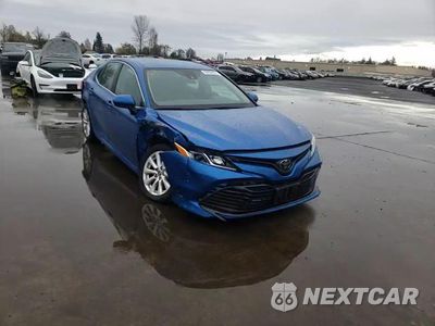 Zdjęcie 11 z 14 samochodu: 2019 TOYOTA CAMRY L VIN:4T1B11HK0KU253487 - miniatura
