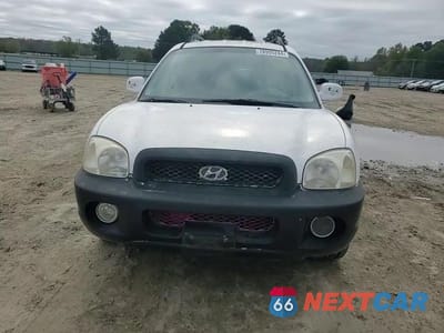 Zdjęcie 11 z 14 samochodu: 2003 HYUNDAI SANTA FE GLS VIN:KM8SC13DX3U565255 - miniatura