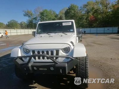 Zdjęcie 11 z 15 samochodu: 2016 JEEP WRANGLER UNLIMITED SAHARA VIN:1C4BJWEG1GL173369 - miniatura