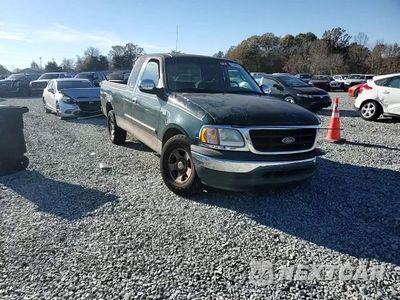 Zdjęcie 10 z 14 samochodu: 2002 FORD F150 VIN:1FTRX17242NA83972 - miniatura