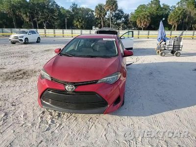 Zdjęcie 14 z 16 samochodu: 2019 TOYOTA COROLLA L VIN:5YFBURHE3KP947057 - miniatura