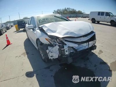Zdjęcie 14 z 16 samochodu: 2020 TOYOTA CAMRY LE VIN:4T1C31AKXLU011221 - miniatura