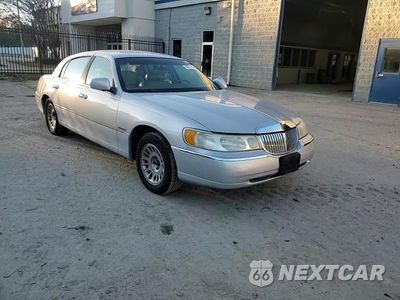 Zdjęcie 13 z 14 samochodu: 2000 LINCOLN TOWN CAR CARTIER VIN:1LNHM83W1YY869365 - miniatura