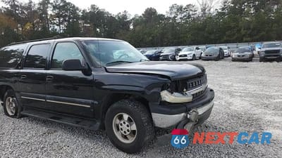Zdjęcie 14 z 15 samochodu: 2001 CHEVROLET SUBURBAN C1500 VIN:3GNEC16T71G178951 - miniatura