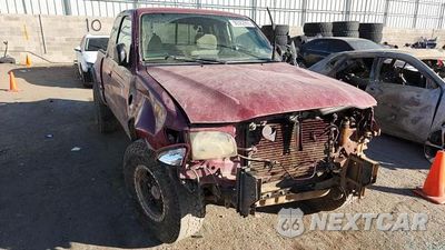 Zdjęcie 13 z 14 samochodu: 2001 TOYOTA TACOMA XTRACAB VIN:5TEWN72N91Z835660 - miniatura