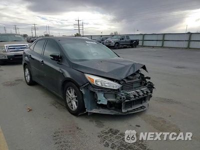 Zdjęcie 13 z 14 samochodu: 2016 FORD FOCUS SE VIN:1FADP3F23GL377833 - miniatura