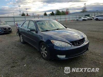 Zdjęcie 13 z 14 samochodu: 2005 TOYOTA CAMRY LE VIN:JTDBF30K250166599 - miniatura