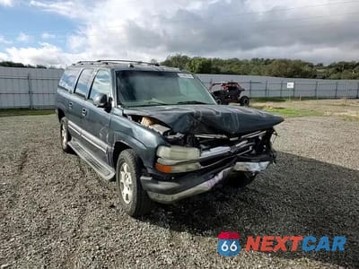 Zdjęcie 14 z 15 samochodu: 2004 CHEVROLET SUBURBAN C1500 VIN:1GNEC16T74J131499 - miniatura