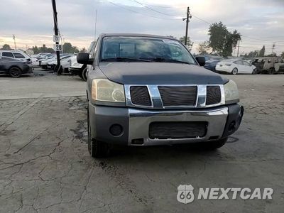 Zdjęcie 13 z 14 samochodu: 2006 NISSAN TITAN XE VIN:1N6AA06AX6N504257 - miniatura