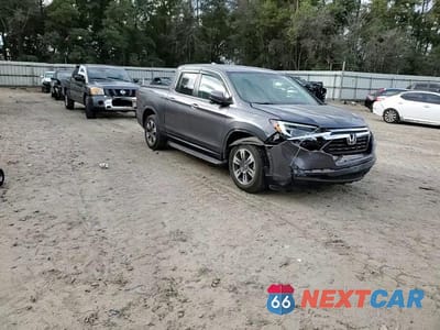 Zdjęcie 14 z 16 samochodu: 2017 HONDA RIDGELINE RTL VIN:5FPYK2F69HB002371 - miniatura