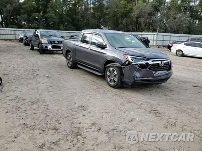 Zdjęcie 14 z 16 samochodu: 2017 HONDA RIDGELINE RTL VIN:5FPYK2F69HB002371 - miniatura