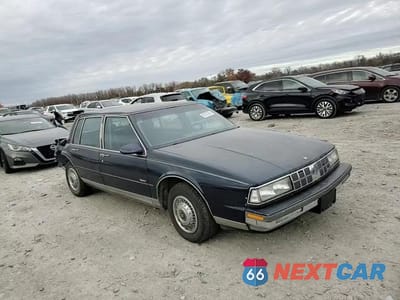 Zdjęcie 13 z 14 samochodu: 1990 OLDSMOBILE 98 REGENCY VIN:1G3CX54CXL4356754 - miniatura