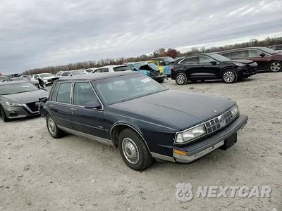 Zdjęcie 13 z 14 samochodu: 1990 OLDSMOBILE 98 REGENCY VIN:1G3CX54CXL4356754 - miniatura