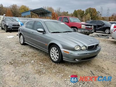Zdjęcie 13 z 14 samochodu: 2003 JAGUAR X-TYPE 2.5 VIN:SAJEA51D43XD55268 - miniatura