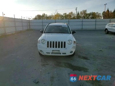 Zdjęcie 14 z 15 samochodu: 2007 JEEP COMPASS VIN:1J8FT470X7D378501 - miniatura