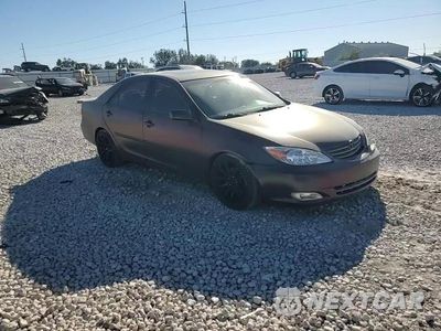 Zdjęcie 13 z 14 samochodu: 2003 TOYOTA CAMRY LE VIN:4T1BF30K43U059412 - miniatura