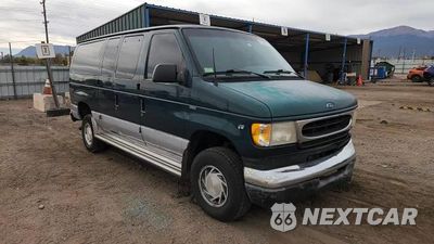 Zdjęcie 14 z 15 samochodu: 1999 FORD ECONOLINE E150 WAGON VIN:1FMRE11L9XHA28314 - miniatura