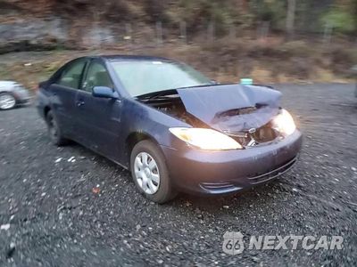 Zdjęcie 13 z 14 samochodu: 2002 TOYOTA CAMRY LE VIN:4T1BE32K92U577692 - miniatura