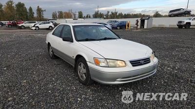Zdjęcie 13 z 14 samochodu: 2001 TOYOTA CAMRY CE VIN:JT2BG22K810589632 - miniatura
