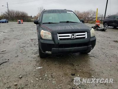 Zdjęcie 14 z 15 samochodu: 2007 HONDA PILOT EXL VIN:2HKYF18577H529790 - miniatura