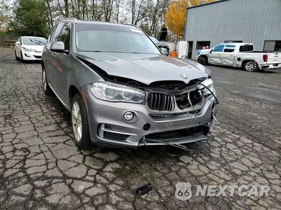 Zdjęcie 13 z 14 samochodu: 2014 BMW X5 XDRIVE35I VIN:5UXKR0C5XE0H28312 - miniatura