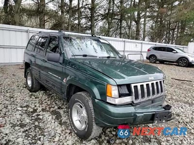 Zdjęcie 14 z 15 samochodu: 1998 JEEP GRAND CHEROKEE LAREDO VIN:1J4GZ48Y7WC276165 - miniatura