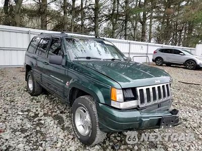 Zdjęcie 14 z 15 samochodu: 1998 JEEP GRAND CHEROKEE LAREDO VIN:1J4GZ48Y7WC276165 - miniatura