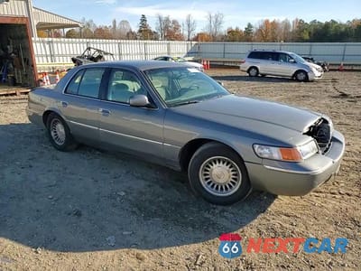 Zdjęcie 13 z 14 samochodu: 1999 MERCURY GRAND MARQUIS LS VIN:2MEFM75W9XX658186 - miniatura