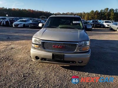 Zdjęcie 14 z 15 samochodu: 2005 GMC YUKON XL DENALI VIN:1GKFK66UX5J197489 - miniatura