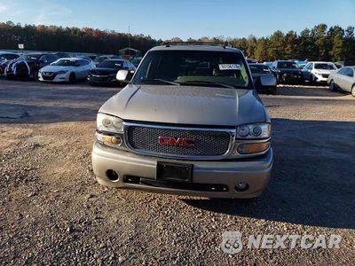 Zdjęcie 14 z 15 samochodu: 2005 GMC YUKON XL DENALI VIN:1GKFK66UX5J197489 - miniatura