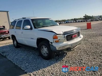 Zdjęcie 14 z 15 samochodu: 2003 GMC YUKON VIN:1GKEC13V33R222112 - miniatura