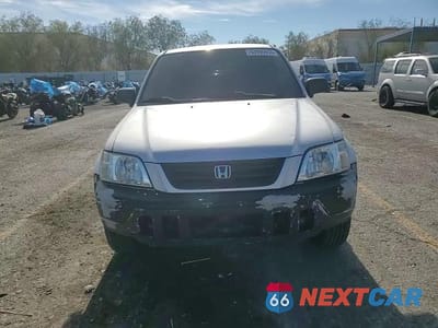 Zdjęcie 14 z 15 samochodu: 1999 HONDA CR-V LX VIN:JHLRD1744XC023691 - miniatura