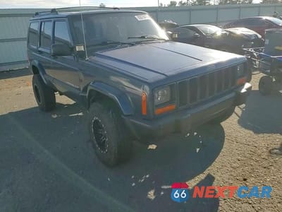 Zdjęcie 14 z 15 samochodu: 2000 JEEP CHEROKEE SPORT VIN:1J4FF48S9YL221154 - miniatura