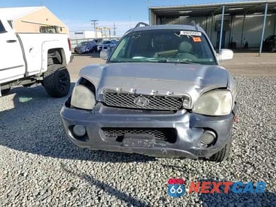 Zdjęcie 14 z 14 samochodu: 2003 HYUNDAI SANTA FE GLS VIN:KM8SC73E23U464917 - miniatura