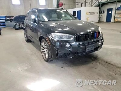 Zdjęcie 14 z 15 samochodu: 2014 BMW X5 XDRIVE50I VIN:5UXKR6C57E0J72346 - miniatura