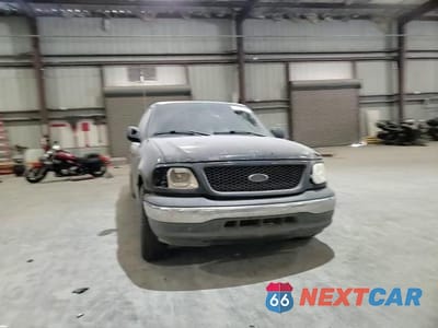 Zdjęcie 13 z 13 samochodu: 2001 FORD F150 SUPERCREW VIN:1FTRW07L11KC61147 - miniatura