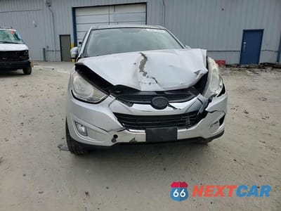 Zdjęcie 12 z 15 samochodu: 2010 HYUNDAI TUCSON GLS VIN:KM8JU3AC7AU102873 - miniatura
