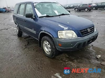 Zdjęcie 11 z 15 samochodu: 1999 HONDA CR-V LX VIN:JHLRD1848XC080829 - miniatura