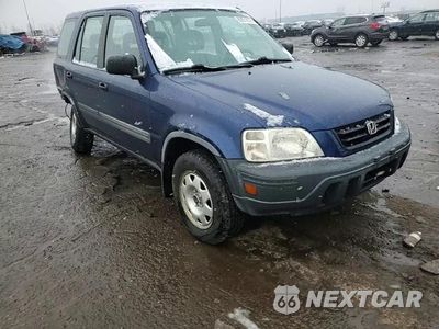 Zdjęcie 11 z 15 samochodu: 1999 HONDA CR-V LX VIN:JHLRD1848XC080829 - miniatura
