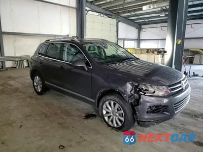 Zdjęcie 12 z 16 samochodu: 2011 VOLKSWAGEN TOUAREG V6 TDI VIN:WVGFK9BP0BD004463 - miniatura