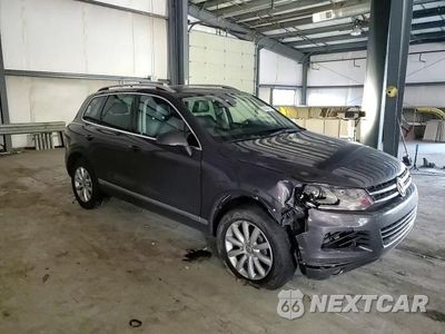 Zdjęcie 12 z 16 samochodu: 2011 VOLKSWAGEN TOUAREG V6 TDI VIN:WVGFK9BP0BD004463 - miniatura