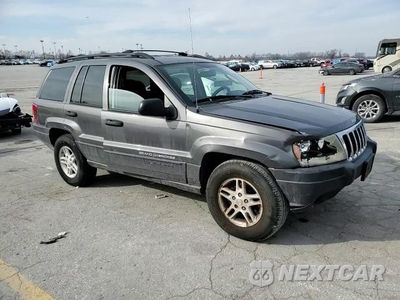 Zdjęcie 12 z 16 samochodu: 2003 JEEP GRAND CHEROKEE LAREDO VIN:1J4GX48N63C559776 - miniatura