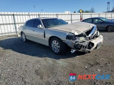 Zdjęcie 10 z 14 samochodu: 2003 LINCOLN TOWN CAR CARTIER VIN:1LNHM83W03Y672471 - miniatura