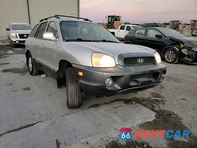 Zdjęcie 12 z 15 samochodu: 2003 HYUNDAI SANTA FE GLS VIN:KM8SC13D93U392375 - miniatura