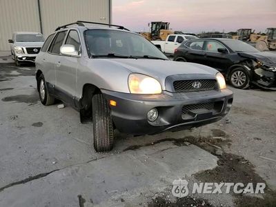 Zdjęcie 12 z 15 samochodu: 2003 HYUNDAI SANTA FE GLS VIN:KM8SC13D93U392375 - miniatura