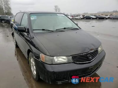 Zdjęcie 11 z 15 samochodu: 2000 HONDA ODYSSEY LX VIN:2HKRL1853YH580900 - miniatura